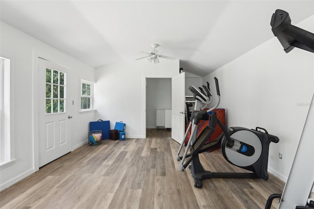 1709 Main St, Safety Harbor, FL 34695 - exercise room with light wood-style flooring, lofted ceiling, ceiling fan, and baseboards