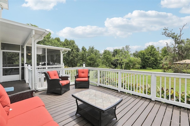 1709 Main St, Safety Harbor, FL 34695 - deck featuring a sunroom and view of scattered trees