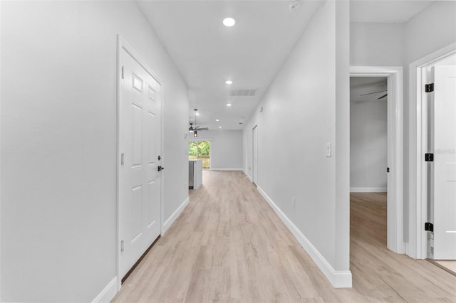 8112 N 10th St, Tampa, FL 33604 - hallway featuring light wood-type flooring, recessed lighting, and baseboards