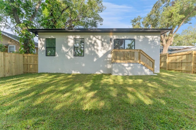 8112 N 10th St, Tampa, FL 33604 - back of property featuring stucco siding