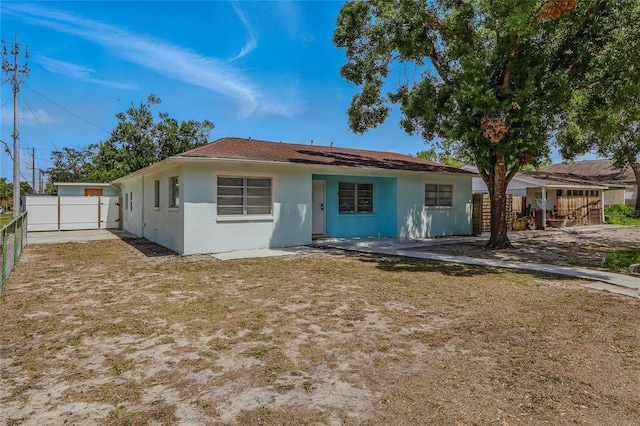 8525 N Ola Ave, Tampa, FL 33604 - back of house featuring stucco siding