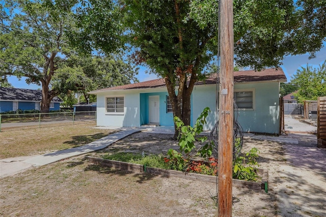 8525 N Ola Ave, Tampa, FL 33604 - view of front of home featuring stucco siding