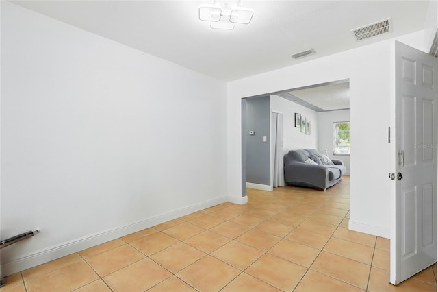 8525 N Ola Ave, Tampa, FL 33604 - unfurnished room featuring light tile patterned flooring and baseboards