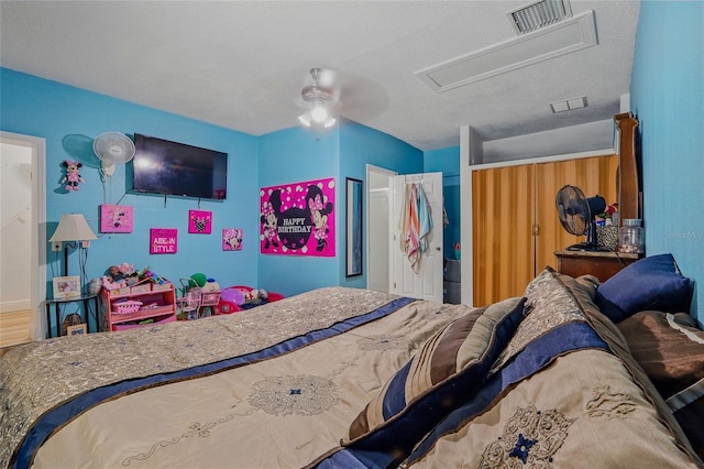 8525 N Ola Ave, Tampa, FL 33604 - bedroom with ceiling fan and attic access