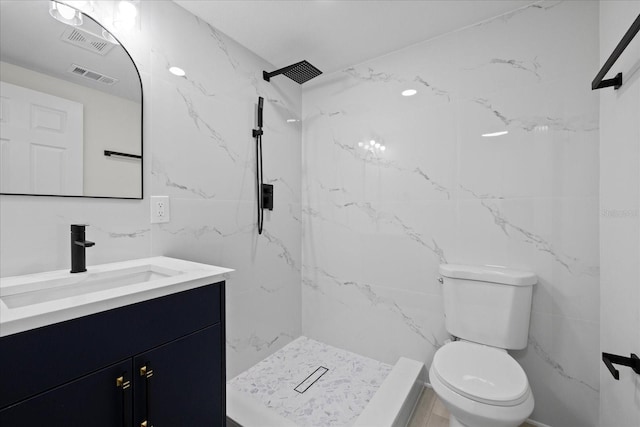 15025 Shark St, Hudson, FL 34667 - full bathroom featuring tile walls, vanity, toilet, and a marble finish shower
