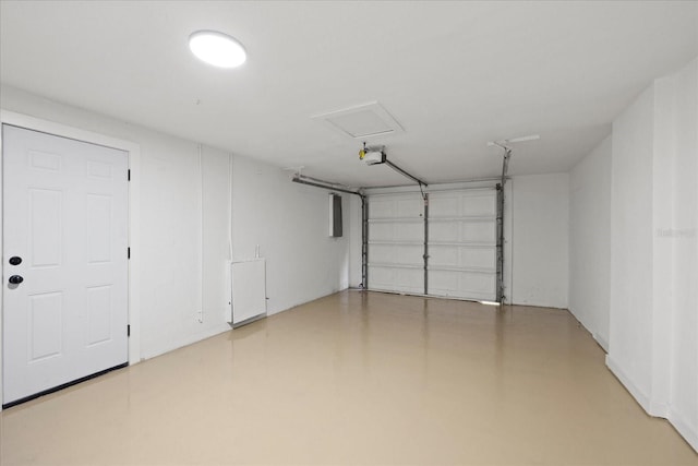 15025 Shark St, Hudson, FL 34667 - garage featuring a garage door opener and electric panel