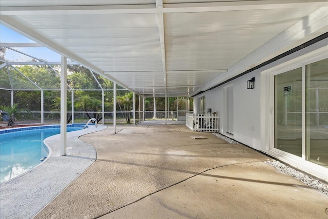 15025 Shark St, Hudson, FL 34667 - swimming pool with a patio area and glass enclosure
