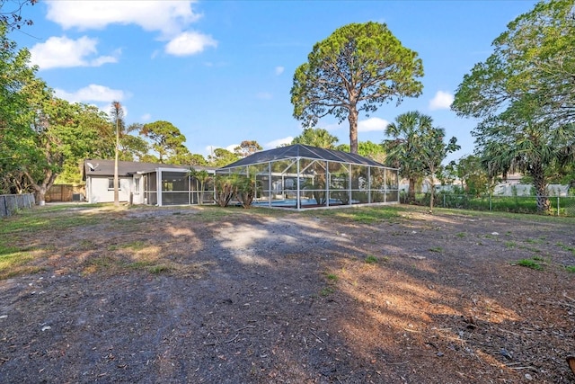 15025 Shark St, Hudson, FL 34667 - rear view of house featuring a pool and a lanai