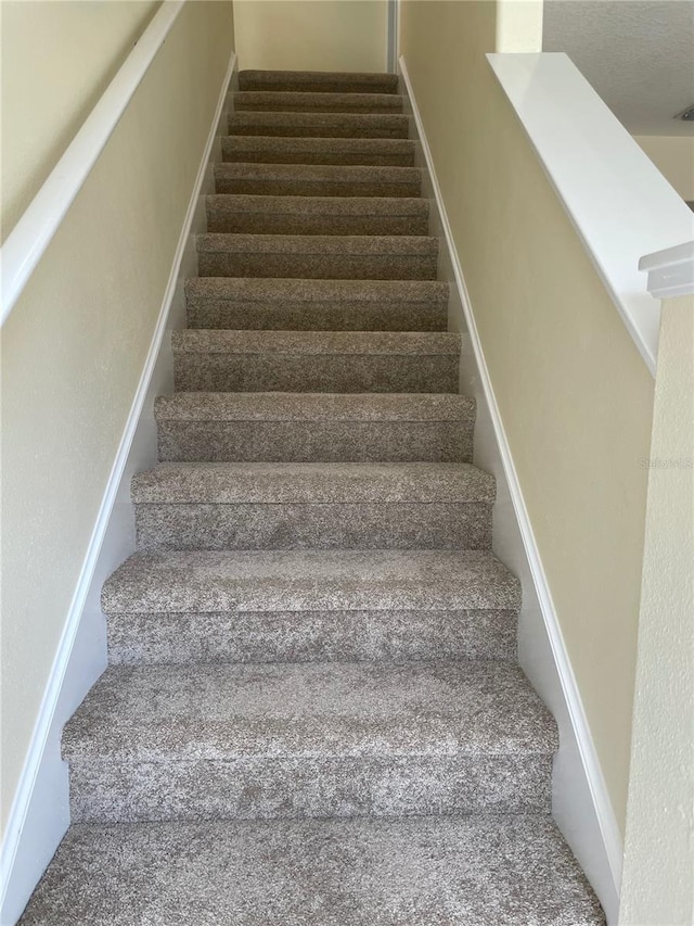 13290 Thoroughbred Loop, Largo, FL 33773 - stairs featuring carpet
