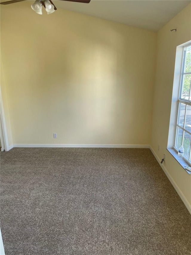 13290 Thoroughbred Loop, Largo, FL 33773 - carpeted spare room with a ceiling fan and baseboards