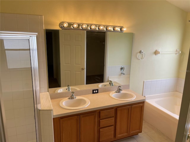 13290 Thoroughbred Loop, Largo, FL 33773 - full bath with a garden tub, double vanity, a stall shower, and tile patterned flooring