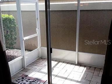 13290 Thoroughbred Loop, Largo, FL 33773 - view of unfurnished sunroom