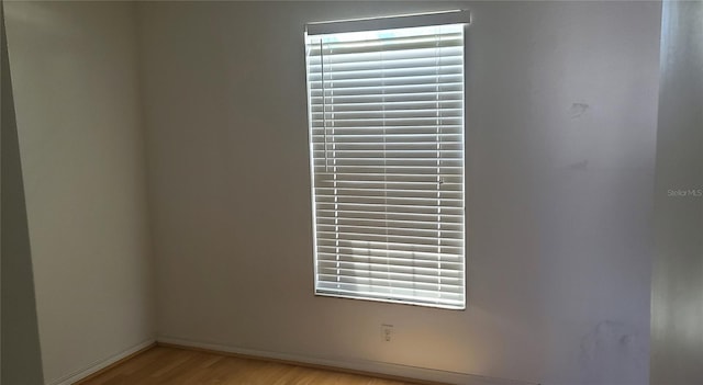 2603 Mary Sue St SW, Largo, FL 33774 - spare room featuring light wood-type flooring and baseboards
