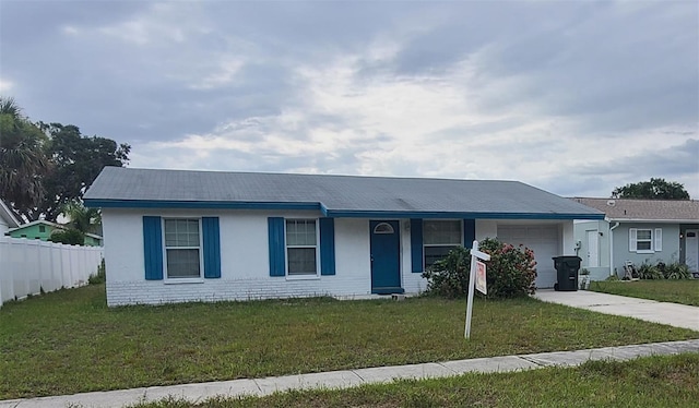 2603 Mary Sue St SW, Largo, FL 33774 - ranch-style home with a garage, concrete driveway, stucco siding, and brick siding