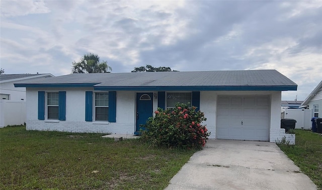 2603 Mary Sue St SW, Largo, FL 33774 - single story home with an attached garage, stucco siding, concrete driveway, and covered porch
