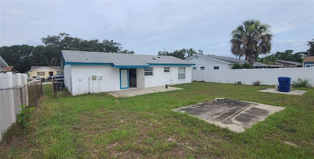 2603 Mary Sue St SW, Largo, FL 33774 - rear view of house featuring a patio and stucco siding