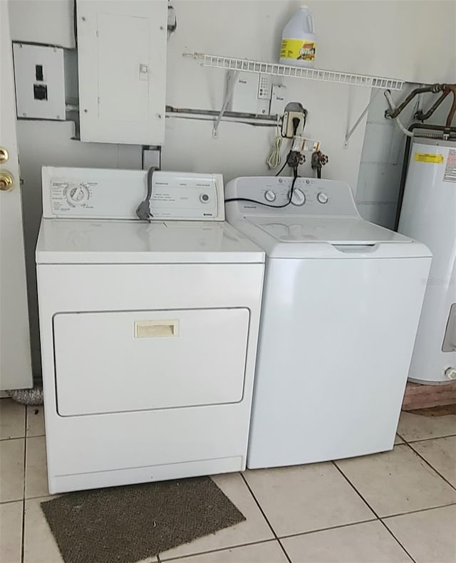 2603 Mary Sue St SW, Largo, FL 33774 - washroom with gas water heater, separate washer and dryer, electric panel, and light tile patterned flooring