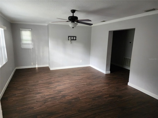 11107 Riverview Dr, Riverview, FL 33578 - empty room with crown molding, a ceiling fan, dark wood-style floors, and a textured ceiling