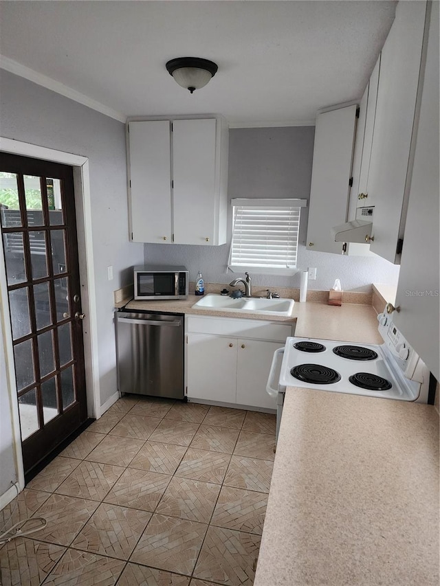 11107 Riverview Dr, Riverview, FL 33578 - kitchen with appliances with stainless steel finishes, exhaust hood, white cabinets, light countertops, and ornamental molding
