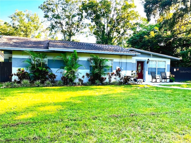 11107 Riverview Dr, Riverview, FL 33578 - ranch-style house featuring a front yard