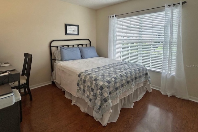 18531 Bent Pine Dr, Hudson, FL 34667 - bedroom with baseboards and wood finished floors