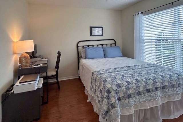 18531 Bent Pine Dr, Hudson, FL 34667 - bedroom with multiple windows and baseboards
