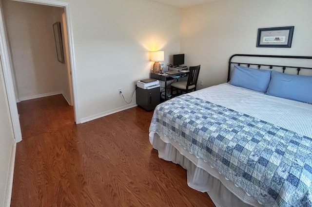 18531 Bent Pine Dr, Hudson, FL 34667 - bedroom featuring wood finished floors and baseboards
