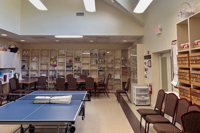 18531 Bent Pine Dr, Hudson, FL 34667 - playroom featuring recessed lighting, tile patterned floors, and a high ceiling