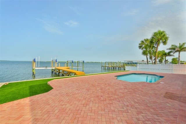 4823 Arlington Rd, Palmetto, FL 34221 - view of swimming pool with boat lift, a boat dock, a water view, and a patio