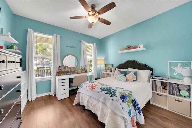 11904 Greenchop Pl, Riverview, FL 33579 - bedroom featuring wood finished floors, ceiling fan, and baseboards