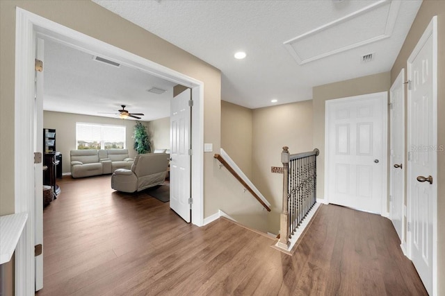11904 Greenchop Pl, Riverview, FL 33579 - hallway with an upstairs landing, attic access, wood finished floors, baseboards, and recessed lighting