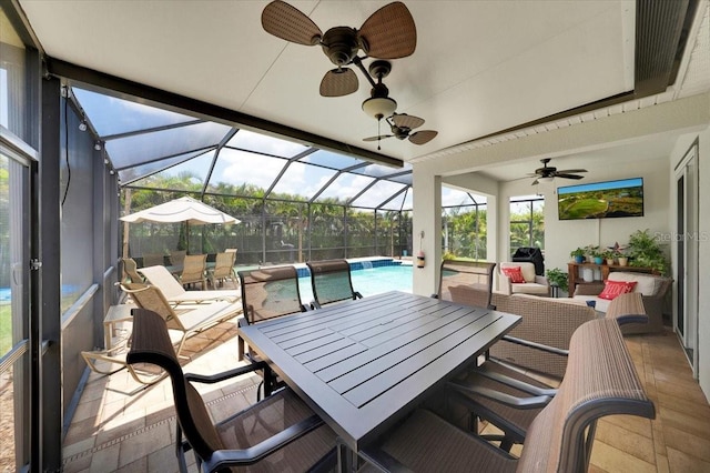 11904 Greenchop Pl, Riverview, FL 33579 - view of patio featuring outdoor dining space, ceiling fan, a lanai, and an outdoor pool
