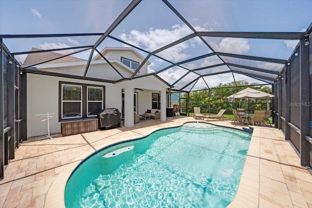 11904 Greenchop Pl, Riverview, FL 33579 - outdoor pool featuring a patio area, area for grilling, outdoor dining area, a lanai, and a ceiling fan
