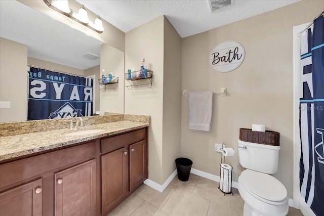 11904 Greenchop Pl, Riverview, FL 33579 - bathroom featuring vanity, toilet, baseboards, tile patterned floors, and a shower with shower curtain