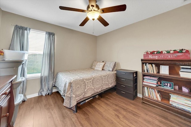 11904 Greenchop Pl, Riverview, FL 33579 - bedroom featuring baseboards, wood finished floors, and ceiling fan