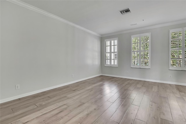 1402 Harbour Walk Rd, Tampa, FL 33602 - spare room with wood finished floors, ornamental molding, and baseboards