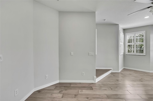1402 Harbour Walk Rd, Tampa, FL 33602 - empty room featuring baseboards, wood finished floors, and ceiling fan