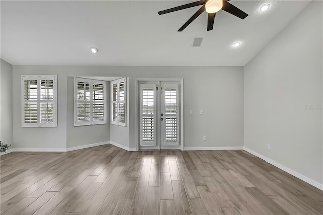 1402 Harbour Walk Rd, Tampa, FL 33602 - unfurnished room with ceiling fan, wood finished floors, baseboards, and recessed lighting