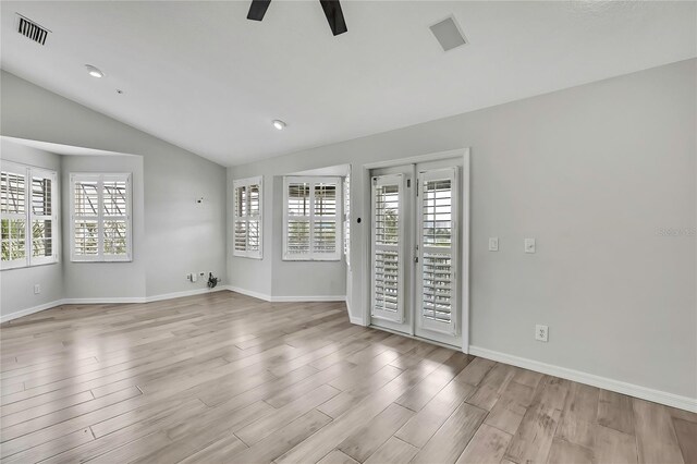 1402 Harbour Walk Rd, Tampa, FL 33602 - unfurnished room with ceiling fan, lofted ceiling, light wood-type flooring, baseboards, and recessed lighting