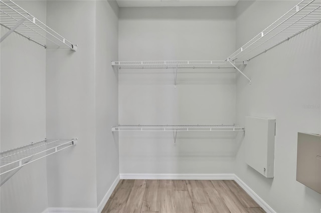 1402 Harbour Walk Rd, Tampa, FL 33602 - spacious closet featuring wood finished floors