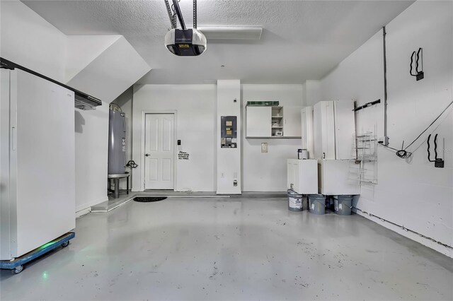 1402 Harbour Walk Rd, Tampa, FL 33602 - garage featuring a garage door opener and freestanding refrigerator