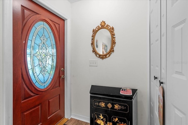 2214 Highclere Cir Unit 6, Sun City Center, FL 33573 - entrance foyer featuring light wood-style floors and baseboards