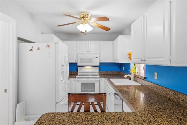 2214 Highclere Cir Unit 6, Sun City Center, FL 33573 - kitchen with white appliances, a sink, a ceiling fan, and white cabinetry
