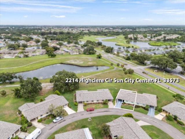 2214 Highclere Cir Unit 6, Sun City Center, FL 33573 - aerial view of property and surrounding area with a large body of water and nearby suburban area