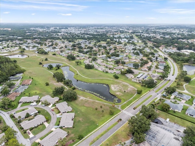 2214 Highclere Cir Unit 6, Sun City Center, FL 33573 - aerial view of property's location featuring a large body of water, nearby suburban area, and a golf club