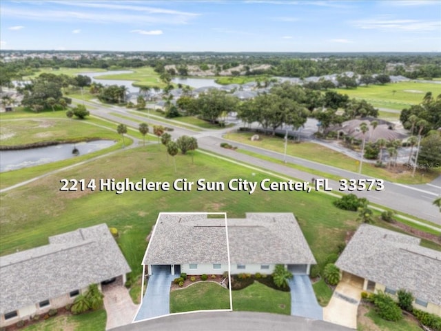 2214 Highclere Cir Unit 6, Sun City Center, FL 33573 - aerial overview of property's location featuring a large body of water, property parcel outlined, and a golf course
