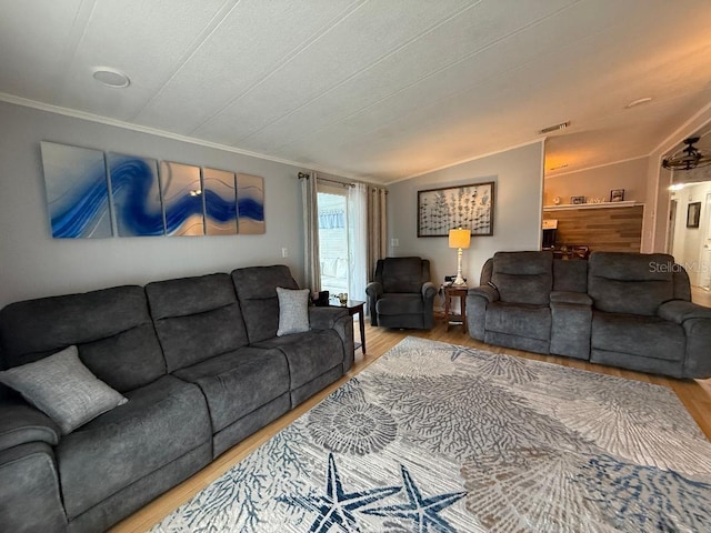 12021 Club House Rd, Brooksville, FL 34613 - living area featuring light wood finished floors, ornamental molding, and lofted ceiling