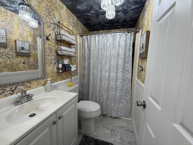12021 Club House Rd, Brooksville, FL 34613 - bathroom featuring wallpapered walls, toilet, marble finish flooring, vanity, and a shower with shower curtain