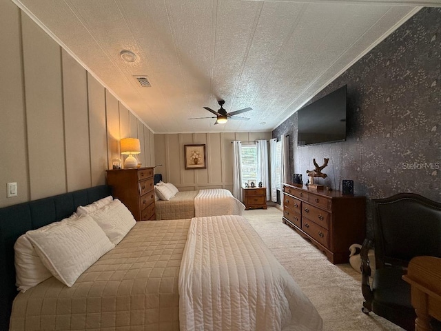 12021 Club House Rd, Brooksville, FL 34613 - bedroom featuring carpet flooring, wallpapered walls, crown molding, and a ceiling fan