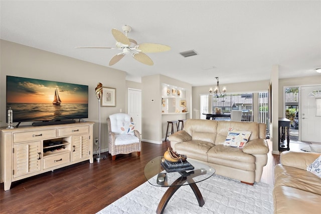 190 Dale Pl, Oldsmar, FL 34677 - living room featuring a chandelier, wood finished floors, plenty of natural light, and ceiling fan